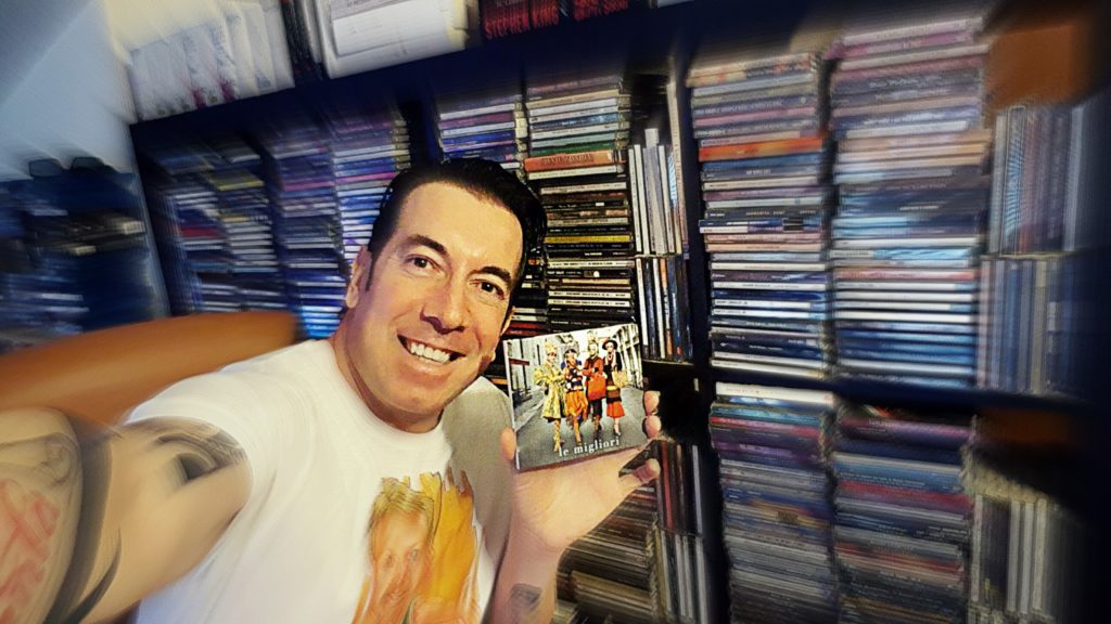 selfie di Federico Spagnoli (uno degli autori di Non mi ami) con la copertina dell'album "Le migliori" di Mina e Celentano